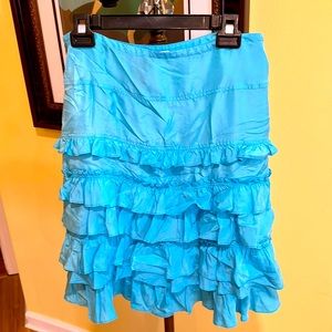 Mexx:size 8 (fits like 4/6)blue satin with ruffles. over the knee. No stretch